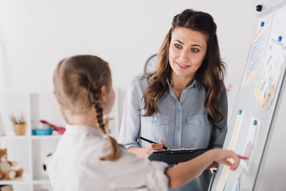 Image showing therapist working with a child with autism.